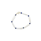 Pearl bracelet handmade in London with rectangle freshwater pearls, small lapis lazuli beads and 9k solid gold spring ring clasp.