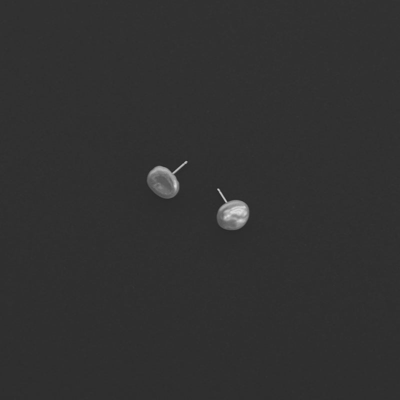 Pearl stud earrings handmade in London with freshwater keshi pearls and 14k gold or sterling silver.